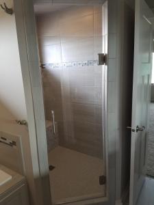 HG Clear Frameless with Beveled hinges, 8" C pull, brushed nickel, bottom sweep